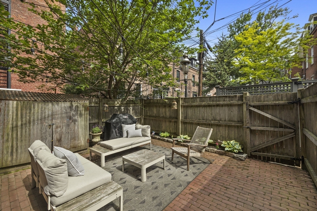 35 High Street, Unit 1 Boston, MA 02129 - Photo 2 of 33 a view of a patio with two chairs and a table