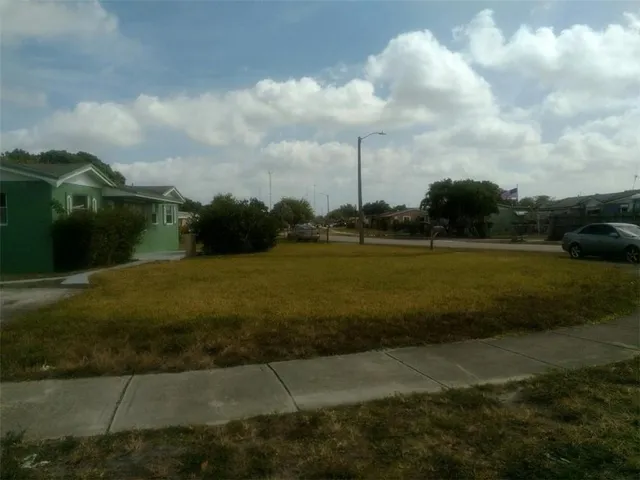 a view of a lake with a big yard
