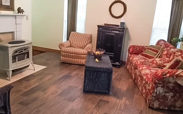 a living room with furniture and a flat screen tv