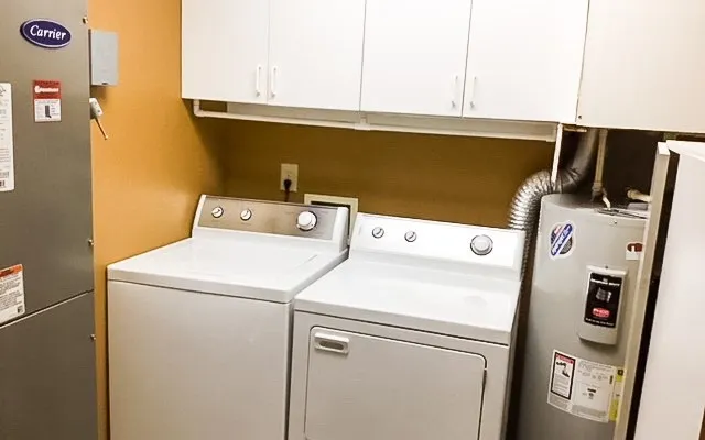 a utility room with dryer and washer