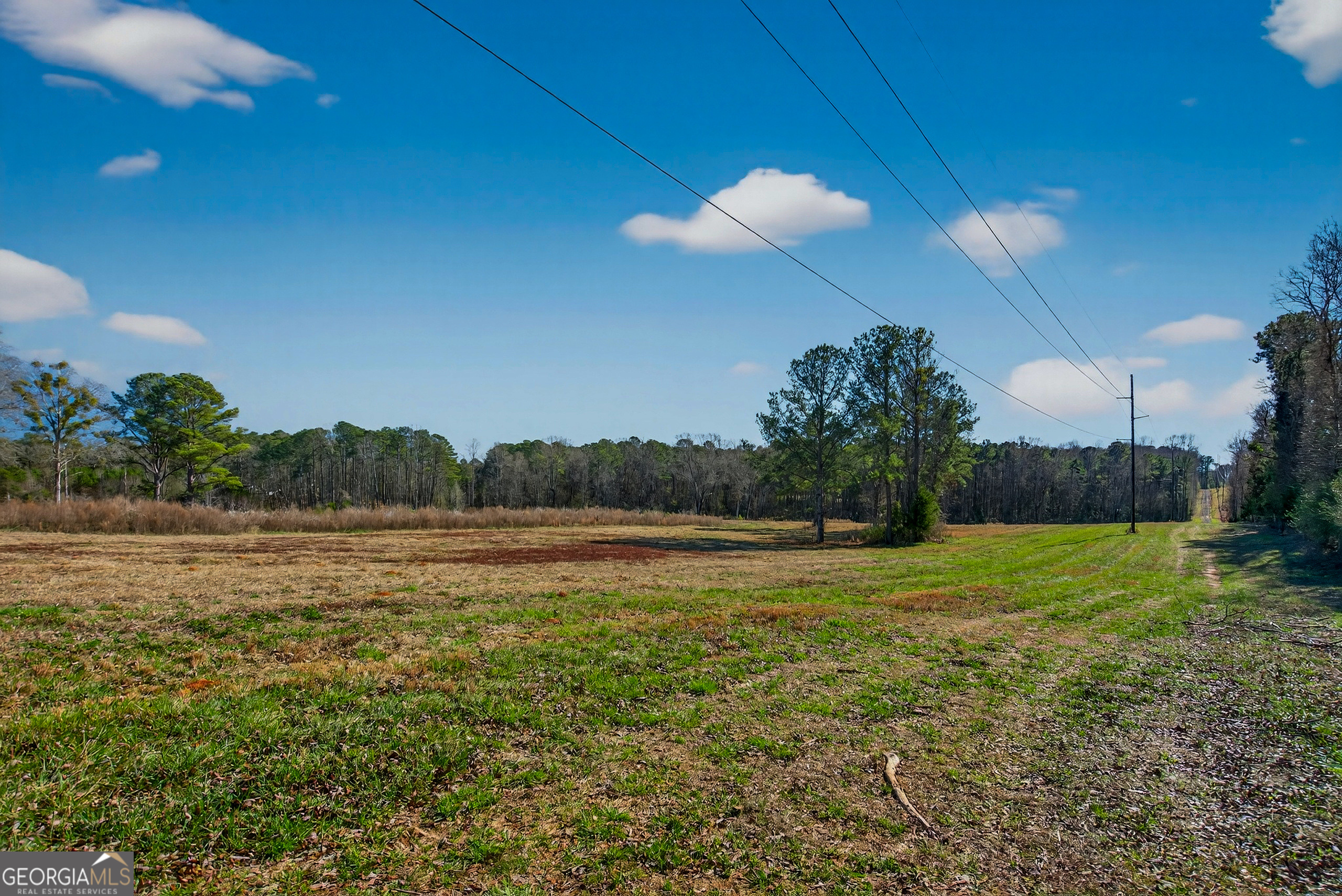0 Glass Bridge Road LaGrange, GA 30240 - Photo 20 of 32 a view of a field of grass and a building