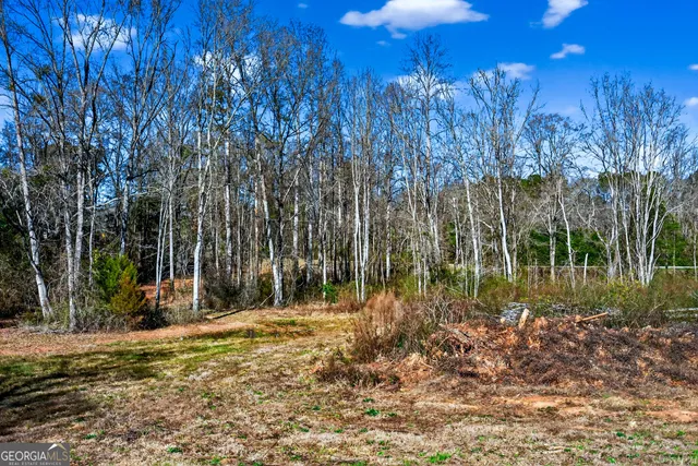 a view of a golf course with a swimming pool