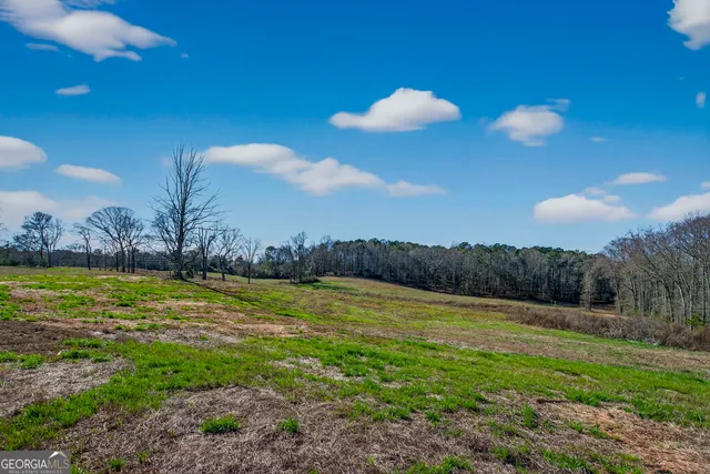 a view of a golf course with a swimming pool
