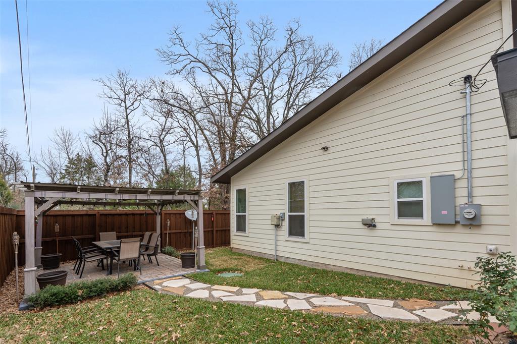 6156 Inca Drive Mabank, TX 75156 - Photo 27 of 30 a view of backyard with large trees and a table
