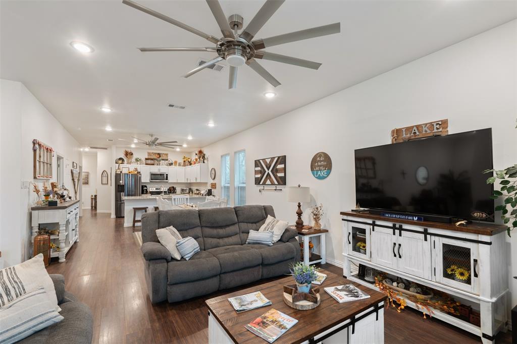 6156 Inca Drive Mabank, TX 75156 - Photo 9 of 30 a living room with furniture and a flat screen tv