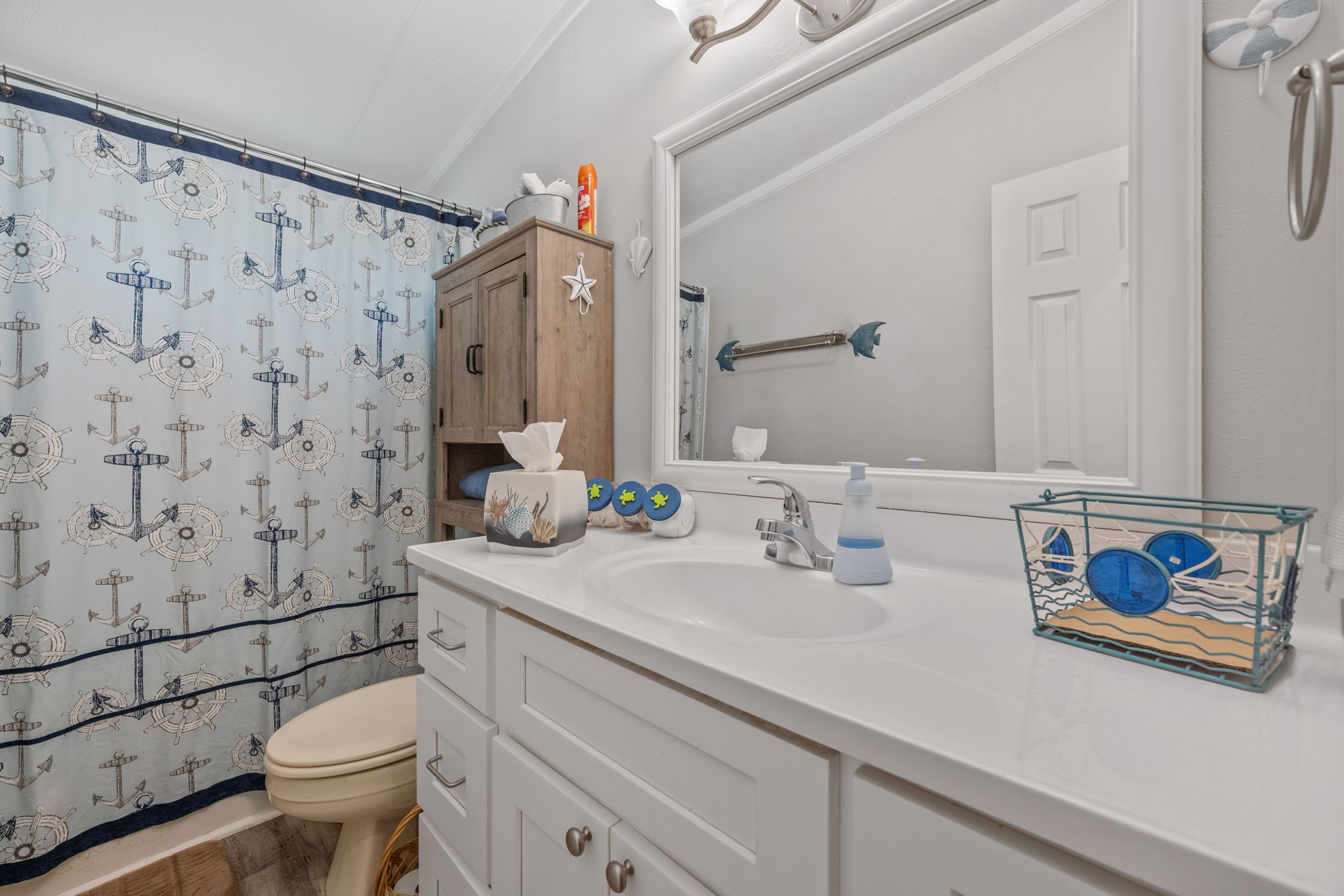 161 W Creek Trinity, TX 75862 - Photo 16 of 22 a bathroom with a sink toilet and shower