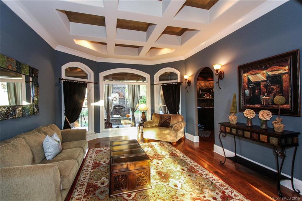7227 Sheffingdell Drive Charlotte, NC 28226 - Photo 2 of 24 a living room with furniture fireplace and rug
