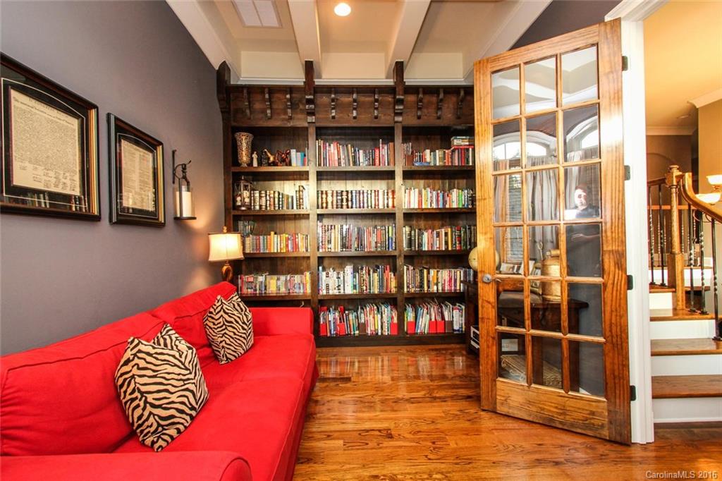 7227 Sheffingdell Drive Charlotte, NC 28226 - Photo 13 of 24 a living room with furniture cabinets and rug