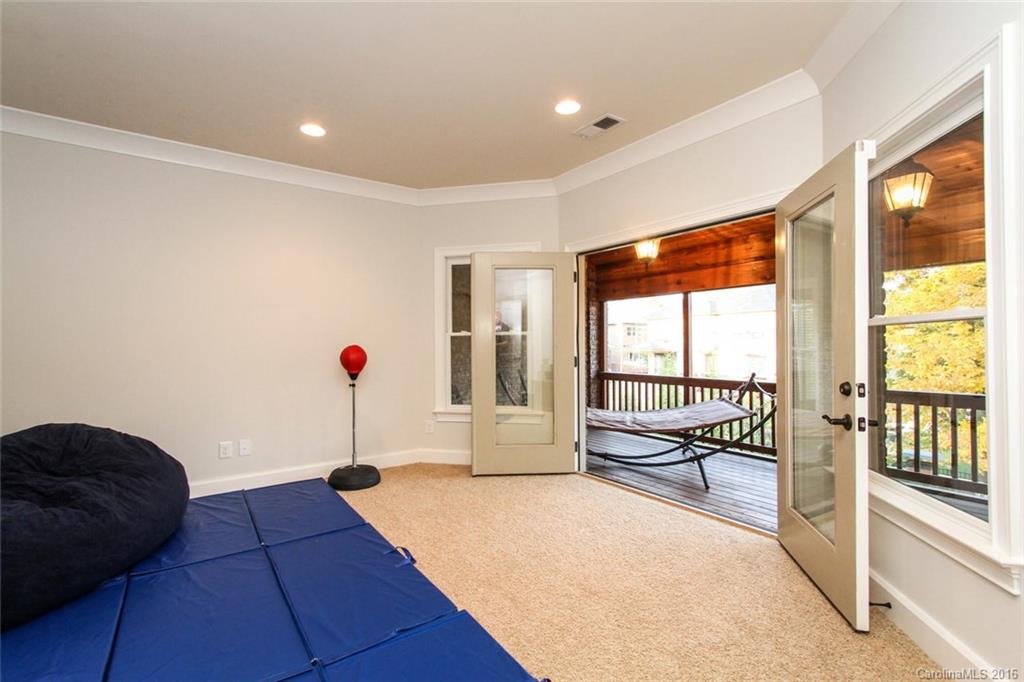 7227 Sheffingdell Drive Charlotte, NC 28226 - Photo 17 of 24 a living room with furniture and a large window