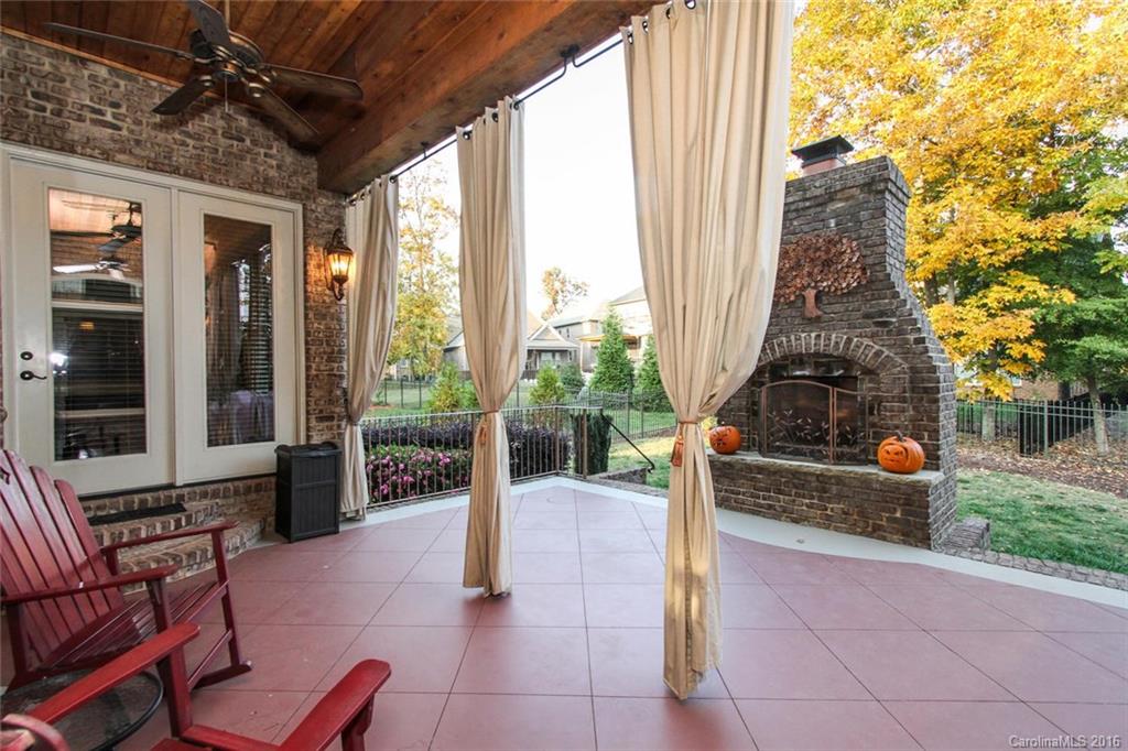 7227 Sheffingdell Drive Charlotte, NC 28226 - Photo 9 of 24 a living room with furniture and a fireplace