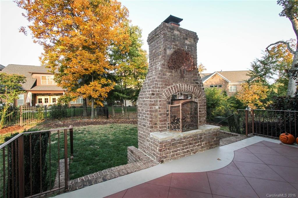 7227 Sheffingdell Drive Charlotte, NC 28226 - Photo 10 of 24 a front view of a house with a garden