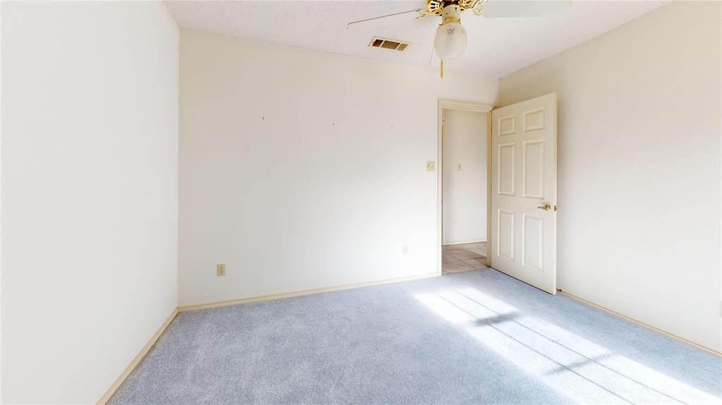 8927 Bontura Road Granbury, TX 76049 - Photo 14 of 23 a view of an empty room with a window
