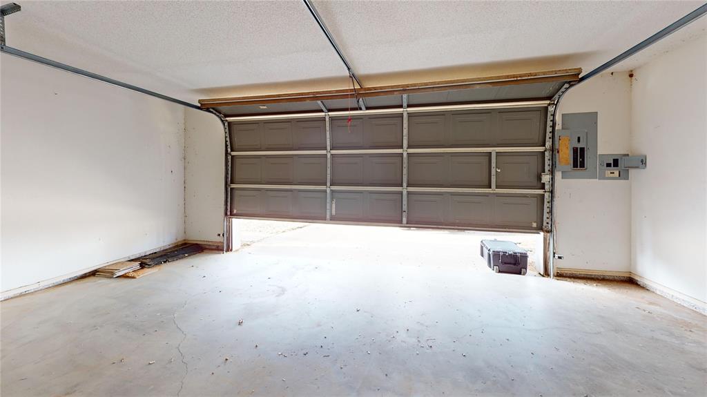 8927 Bontura Road Granbury, TX 76049 - Photo 10 of 23 a view of a room with wooden walls