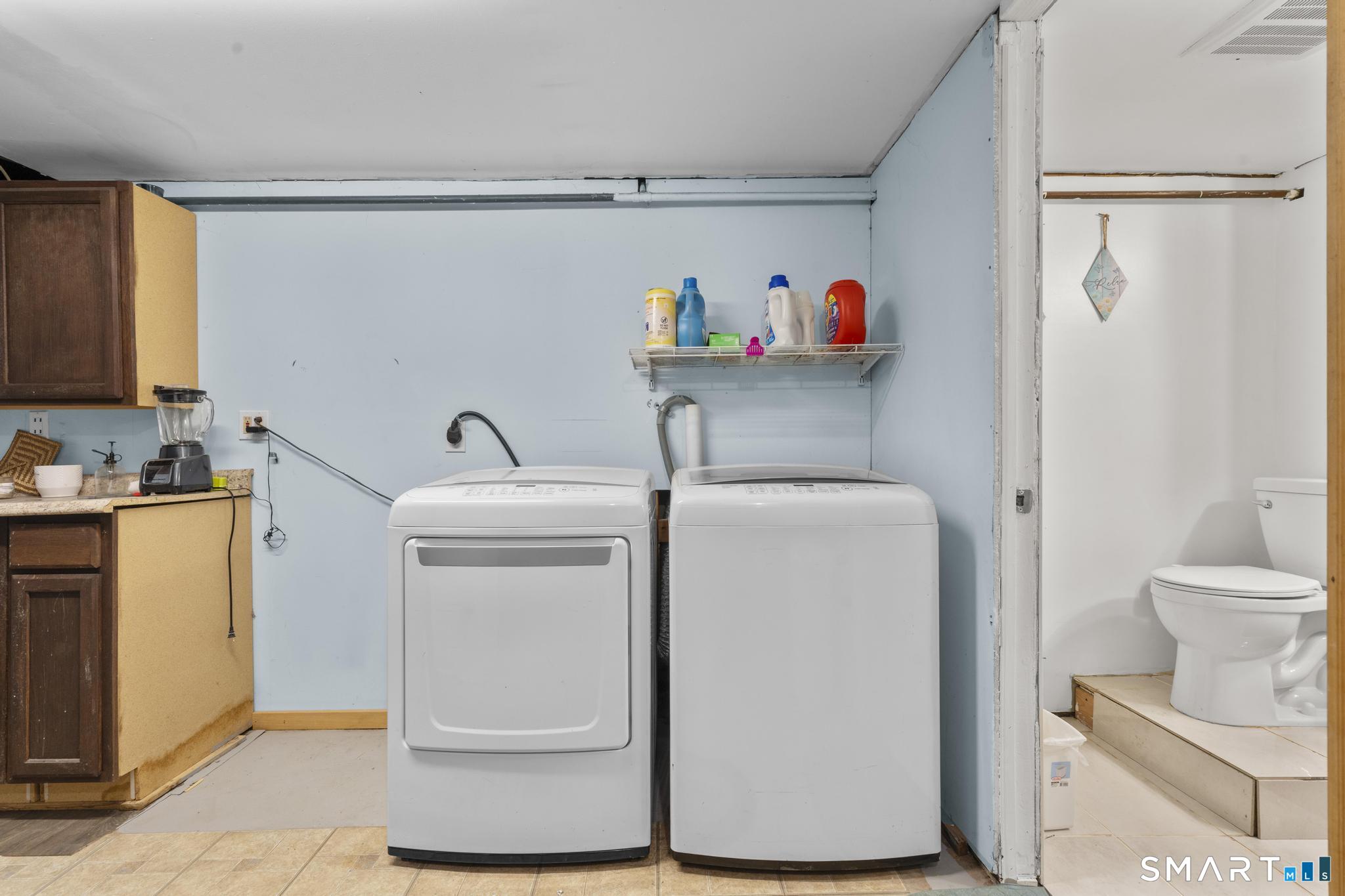 208 Bungay Road Seymour, CT 06483 - Photo 18 of 28 a utility room with sink dryer and washer