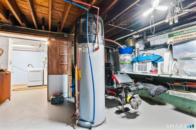a view of a patio with couches chairs and a fire pit