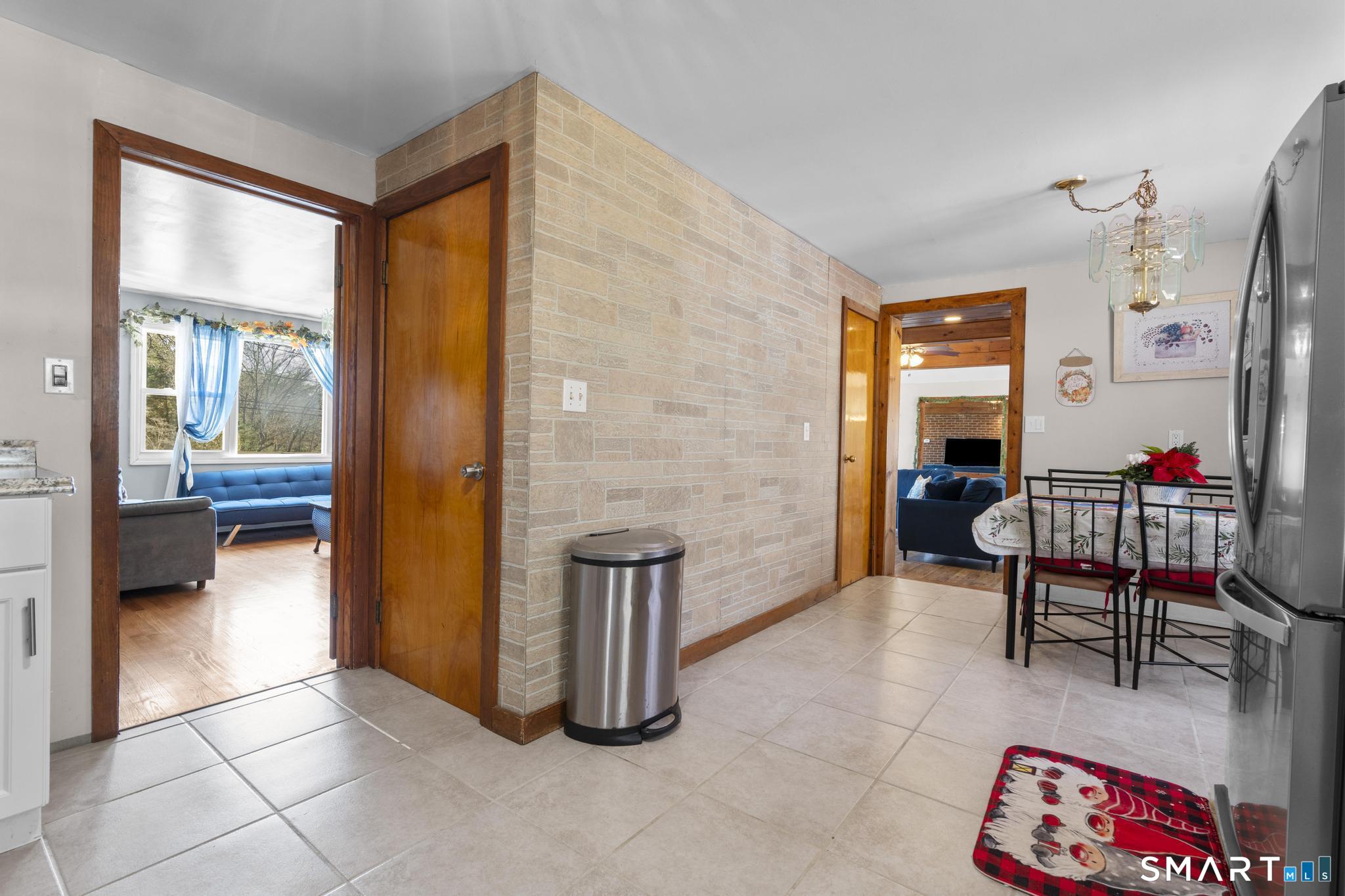 208 Bungay Road Seymour, CT 06483 - Photo 4 of 28 a balcony with furniture and a gate