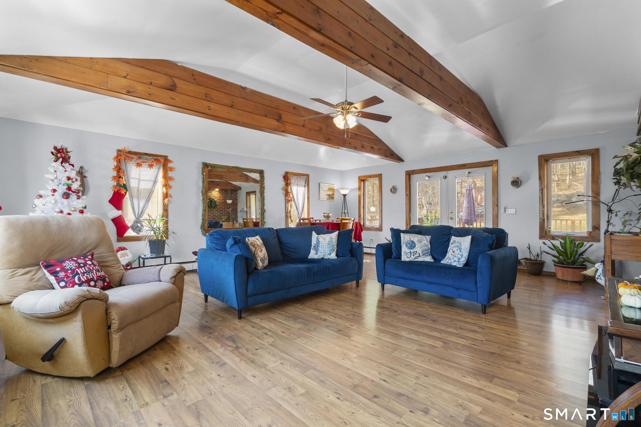 208 Bungay Road Seymour, CT 06483 - Photo 5 of 28 a living room with furniture and wooden floor