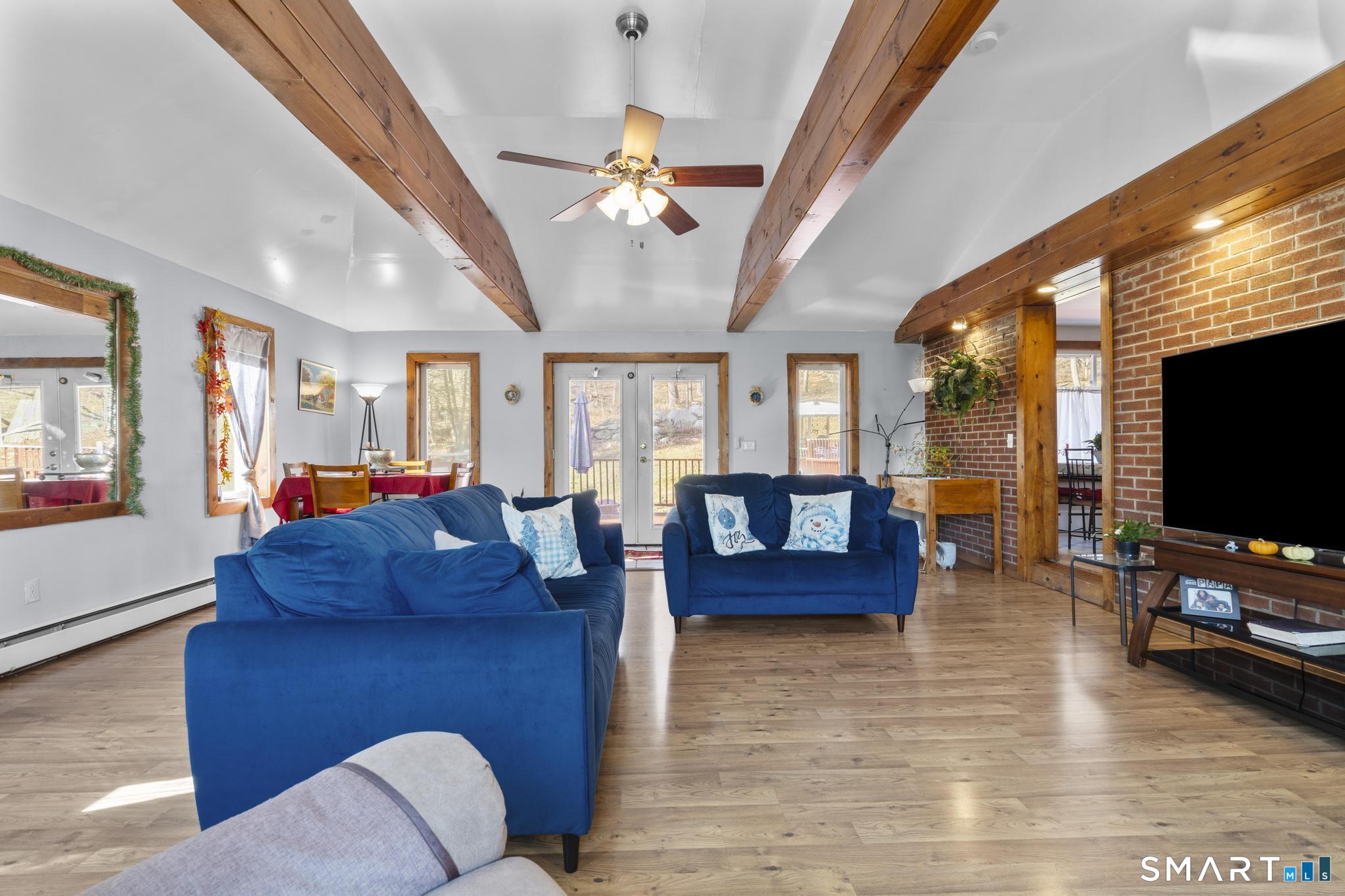 208 Bungay Road Seymour, CT 06483 - Photo 6 of 28 a living room with furniture and a flat screen tv