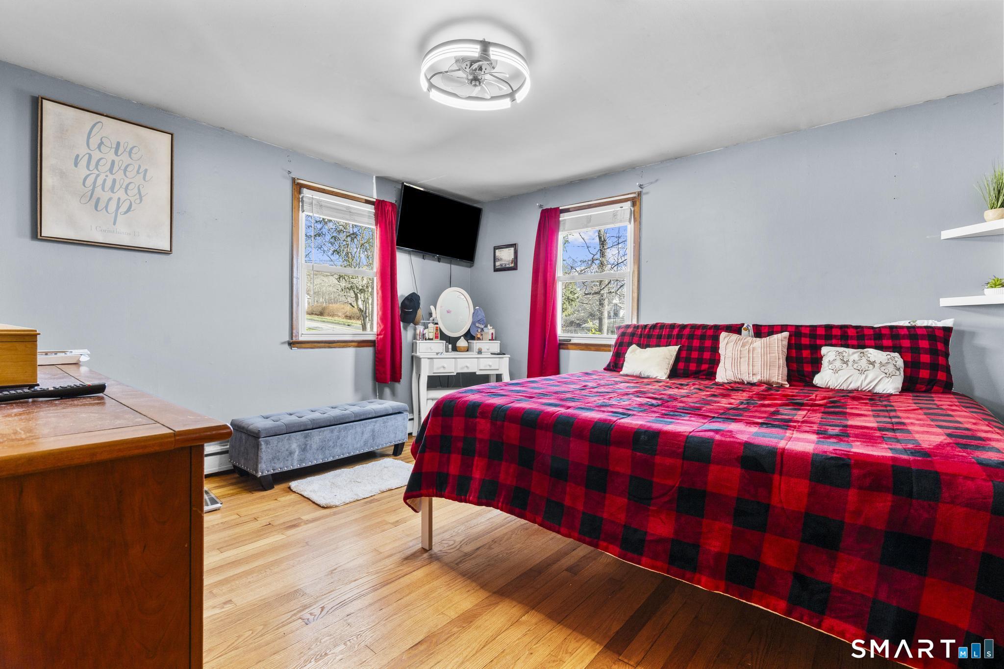 208 Bungay Road Seymour, CT 06483 - Photo 8 of 28 a bedroom with a bed and a desk