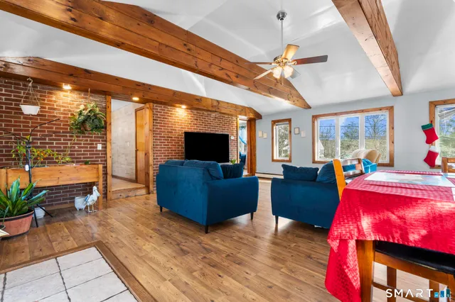 a bedroom with a bed and a desk