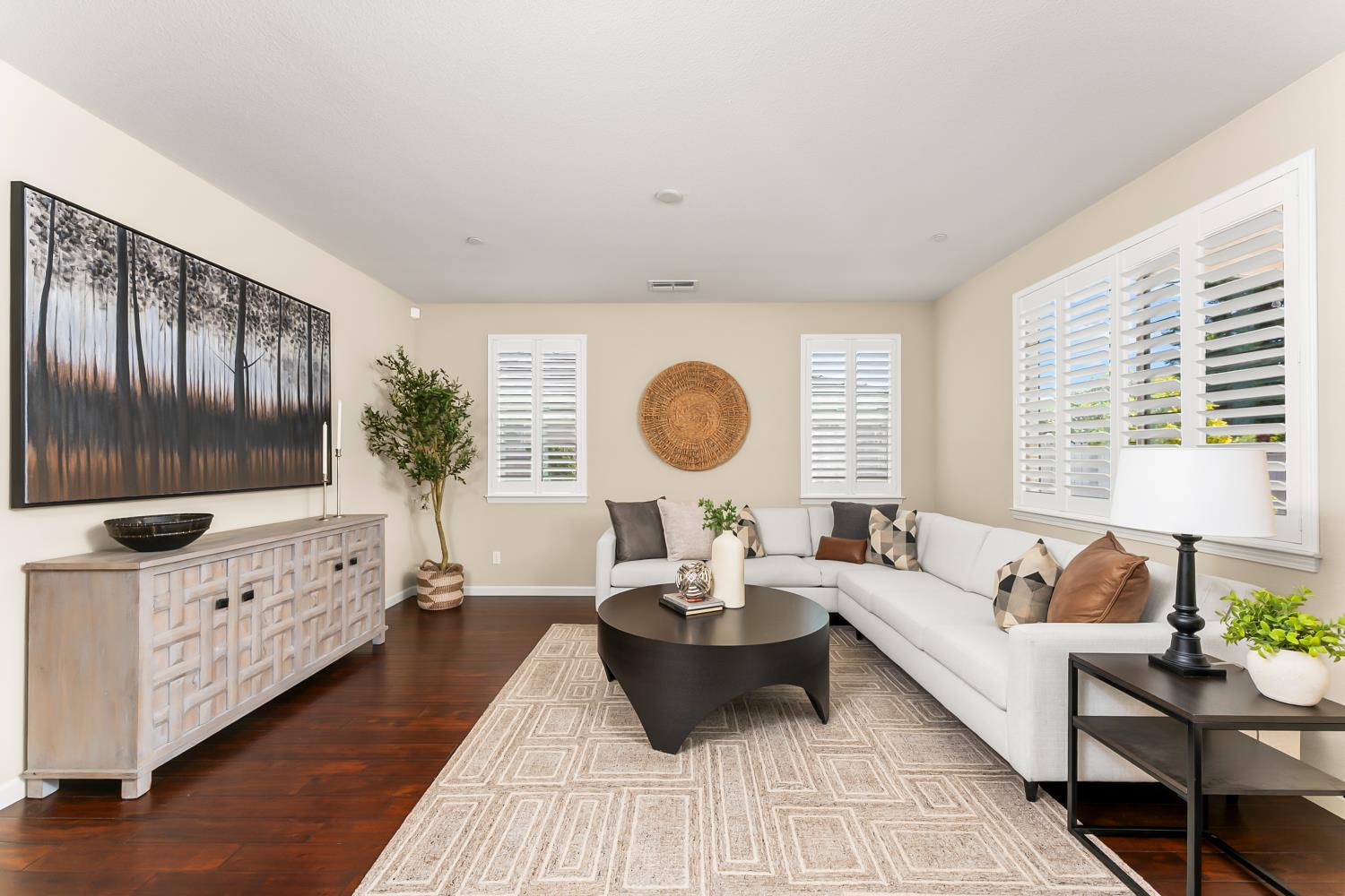5453 Mossy Stone Way Rancho Cordova, CA 95742 - Photo 27 of 81 a living room with furniture and a large window