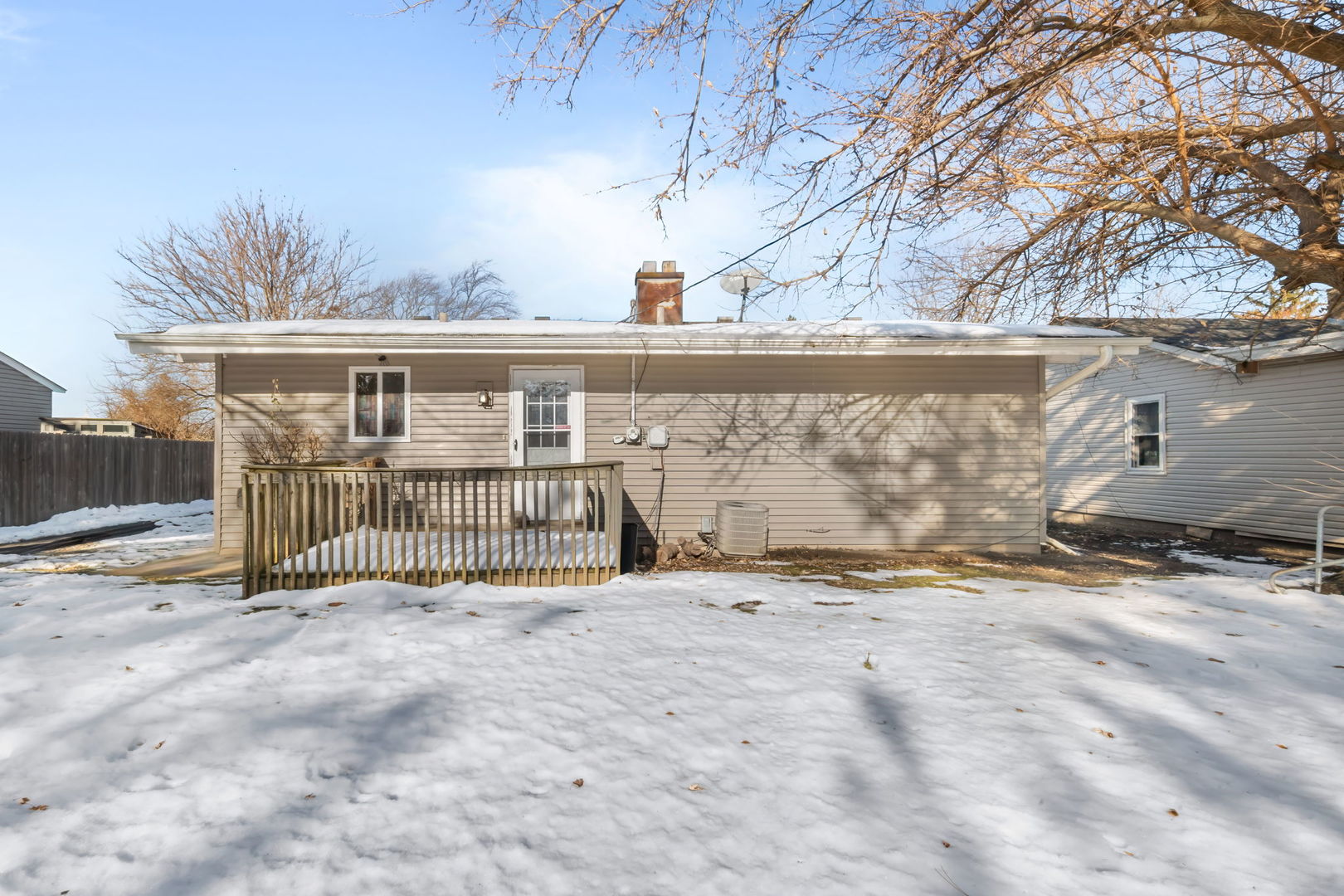 18945 West Old Plank Road Grayslake, IL 60030 - Photo 21 of 21 a view of a house with a small yard and wooden fence