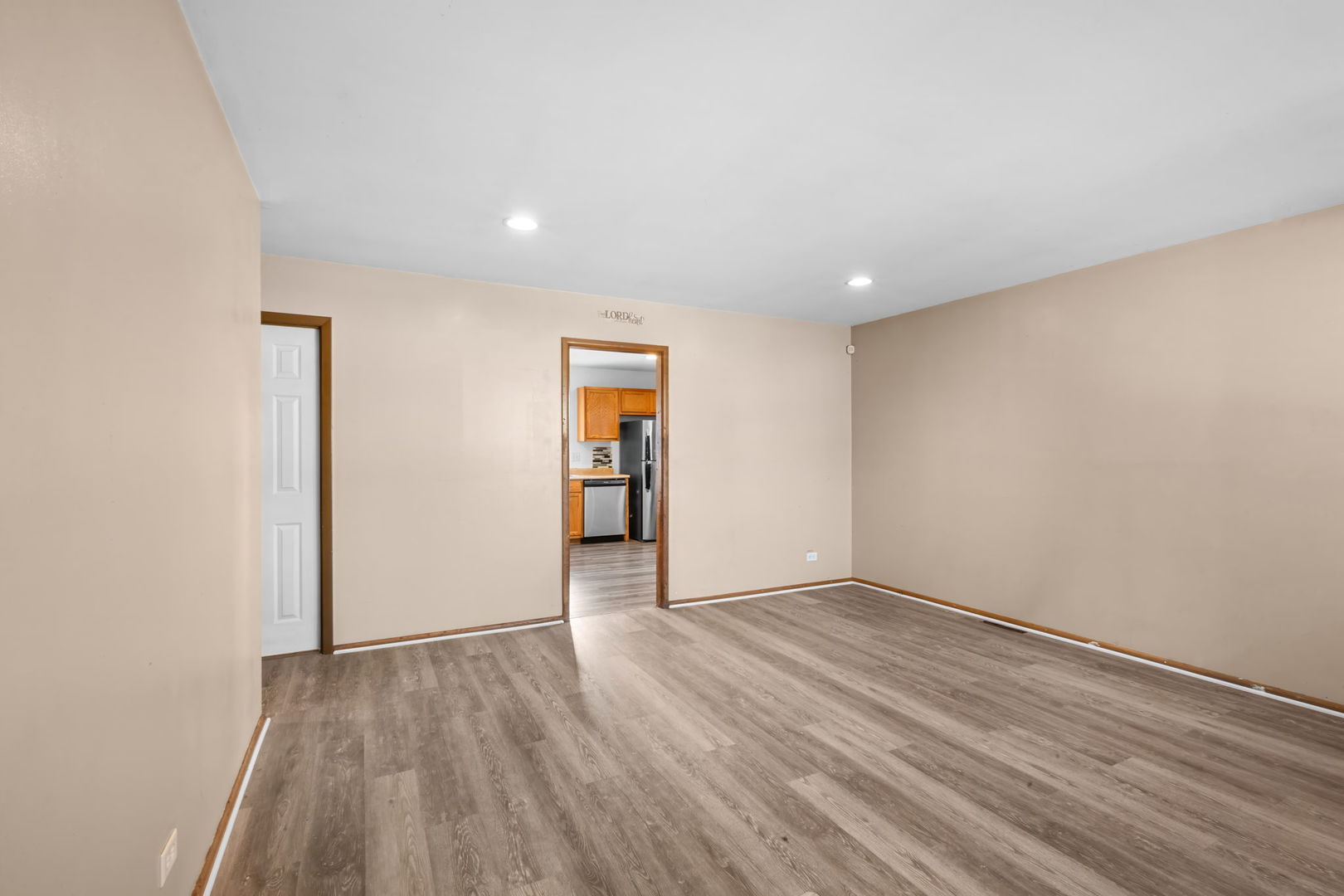18945 West Old Plank Road Grayslake, IL 60030 - Photo 5 of 21 an empty room with wooden floor and closet