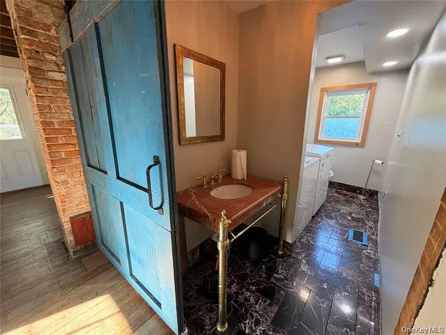 a room with furniture and a window