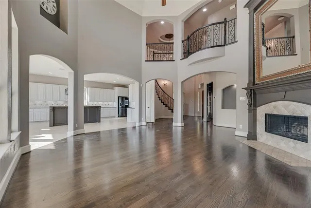 a view of livingroom with fireplace and wooden floor