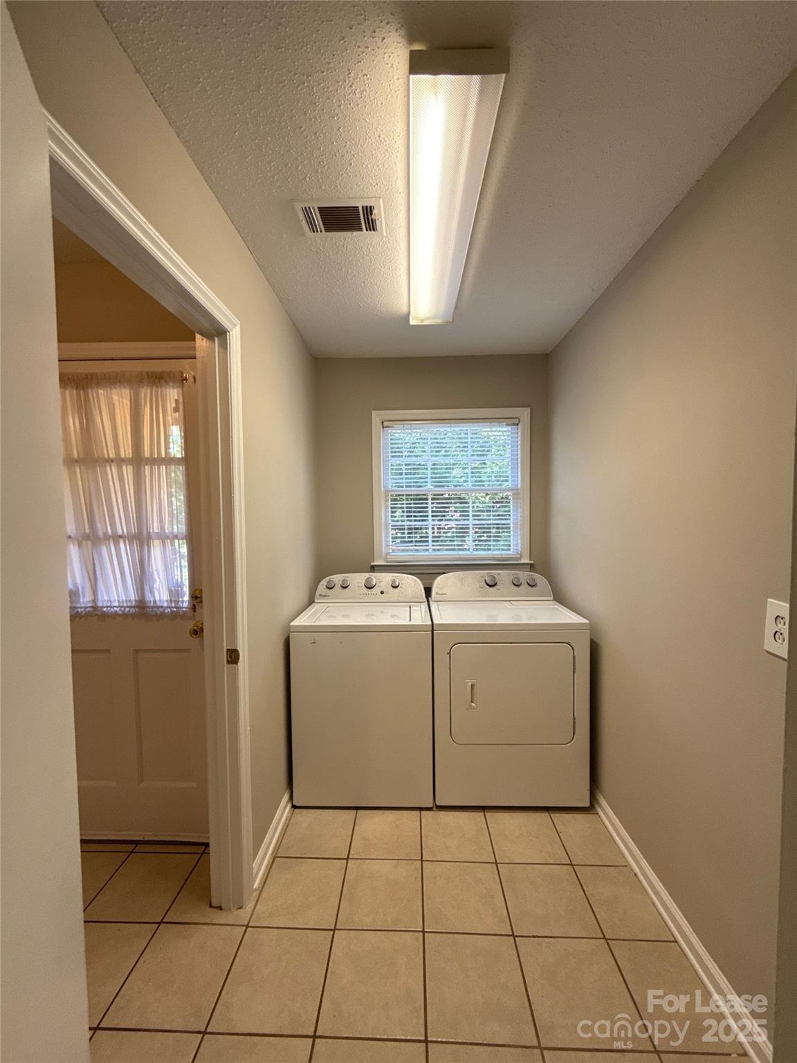 906 McLaughlin Drive Charlotte, NC 28212 - Photo 13 of 21 a utility room with dryer and washer