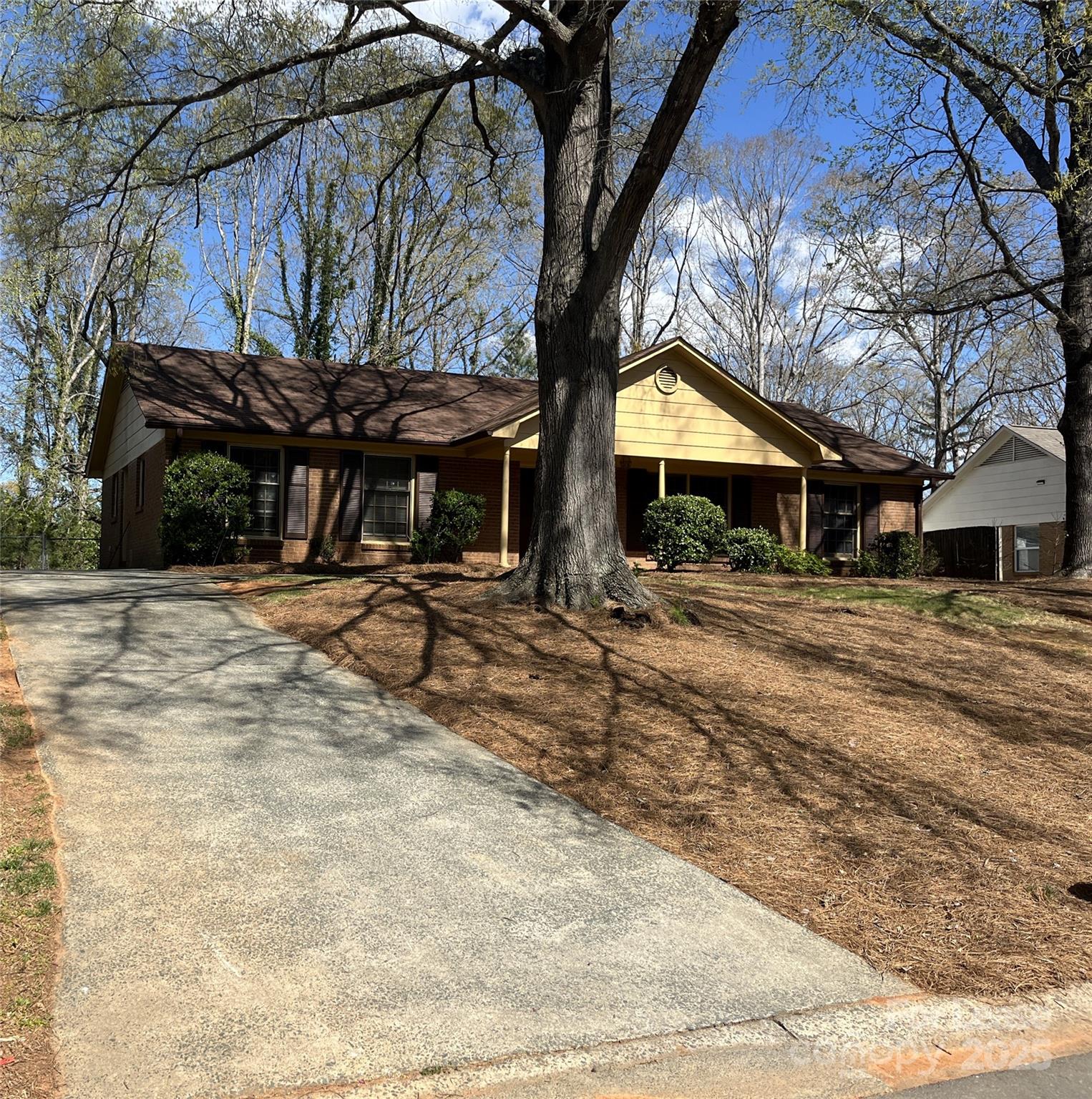 906 McLaughlin Drive Charlotte, NC 28212 - Photo 2 of 21 a building with trees in front of it