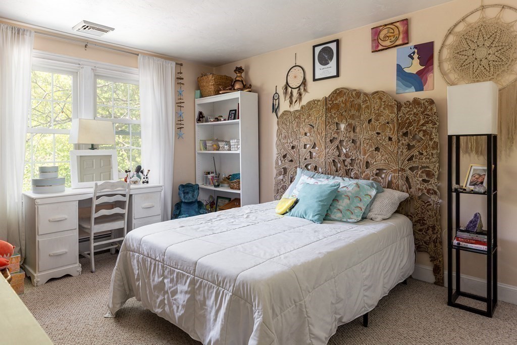 51 Davis Street Northborough, MA 01532 - Photo 19 of 35 a bedroom with a bed and a window