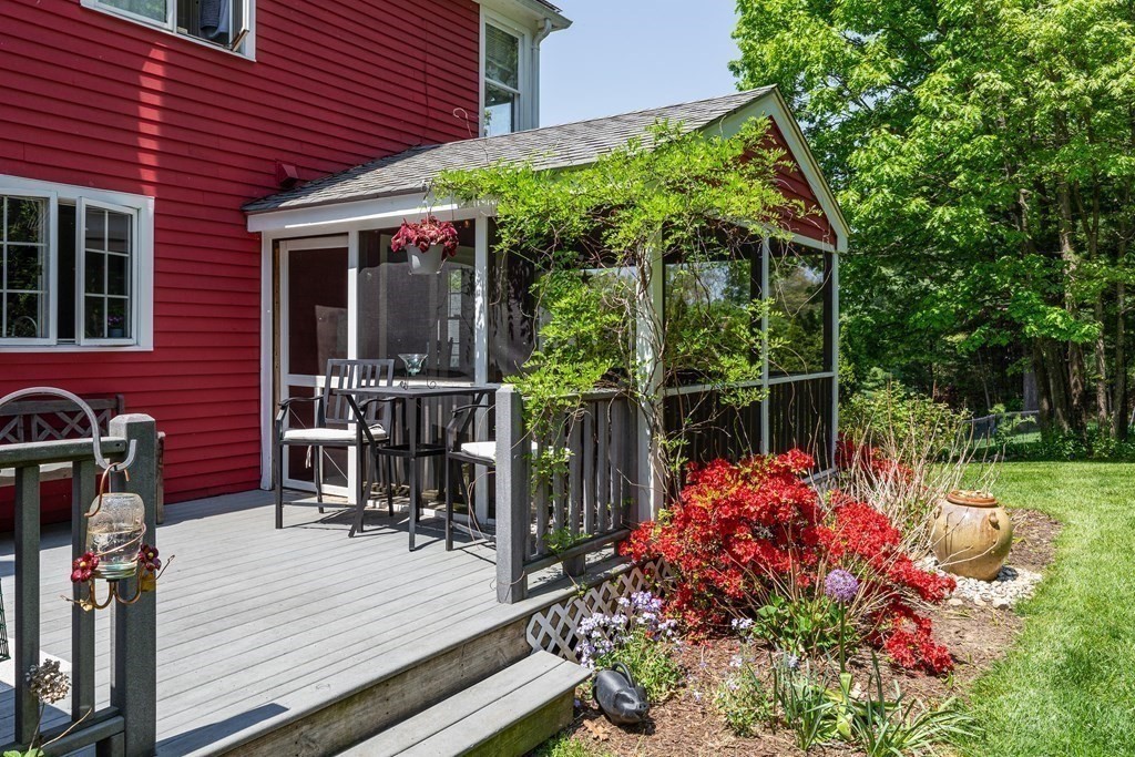 51 Davis Street Northborough, MA 01532 - Photo 32 of 35 a backyard of a house with lots of green space and fountain