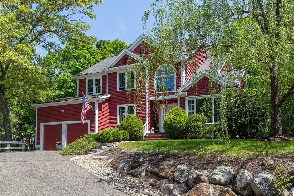 51 Davis Street Northborough, MA 01532 - Photo 35 of 35 a front view of a house with garden