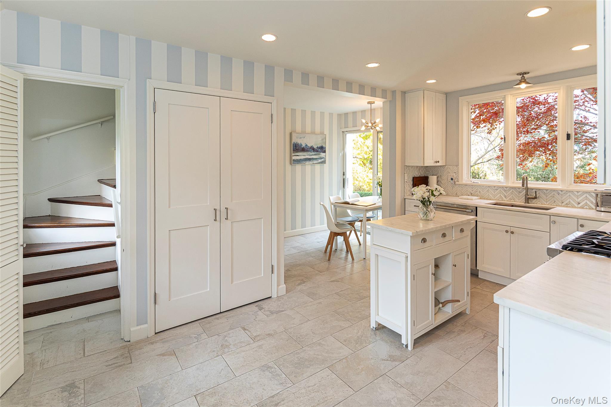 80 Hereford Road Bronxville, NY 10708 - Photo 17 of 36 Kitchen with tasteful backsplash, Danby marble countertops and stainless steel appliances