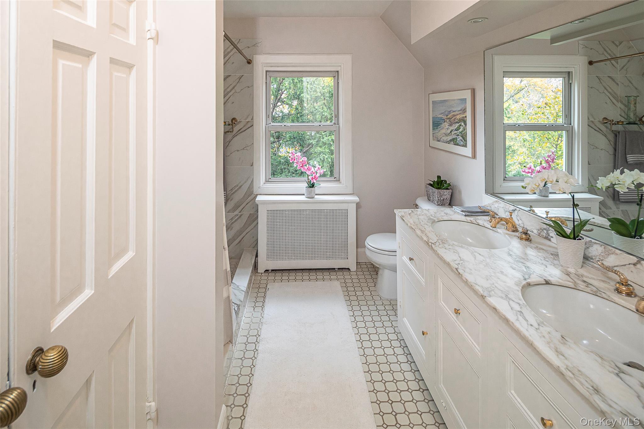 80 Hereford Road Bronxville, NY 10708 - Photo 24 of 36 Primary en suite marble bath with double sinks