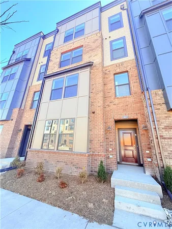 a front view of a multi story residential apartment building