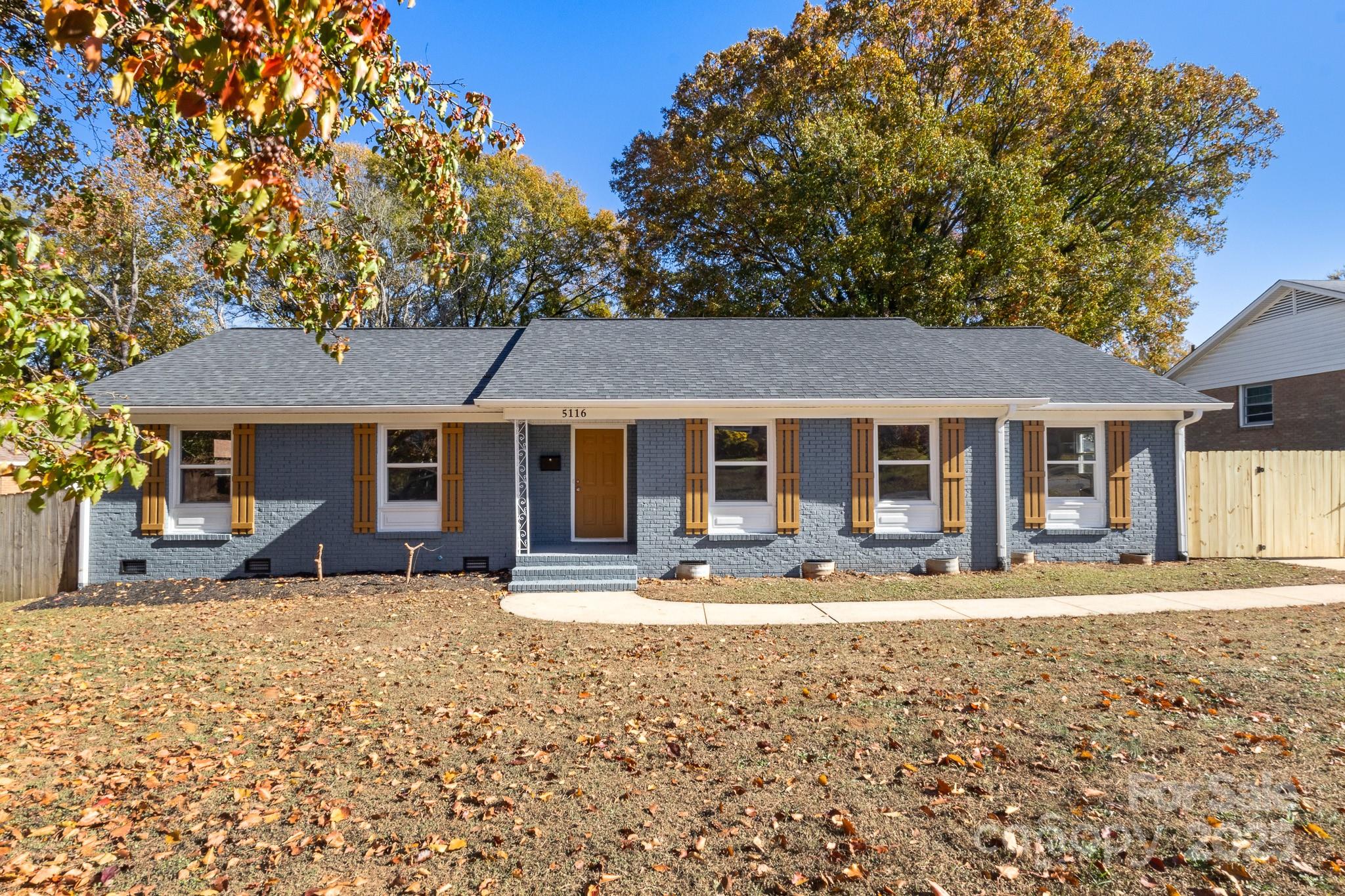 front view of a house with a patio