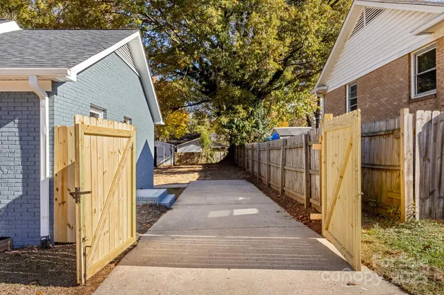 a house view with a backyard space