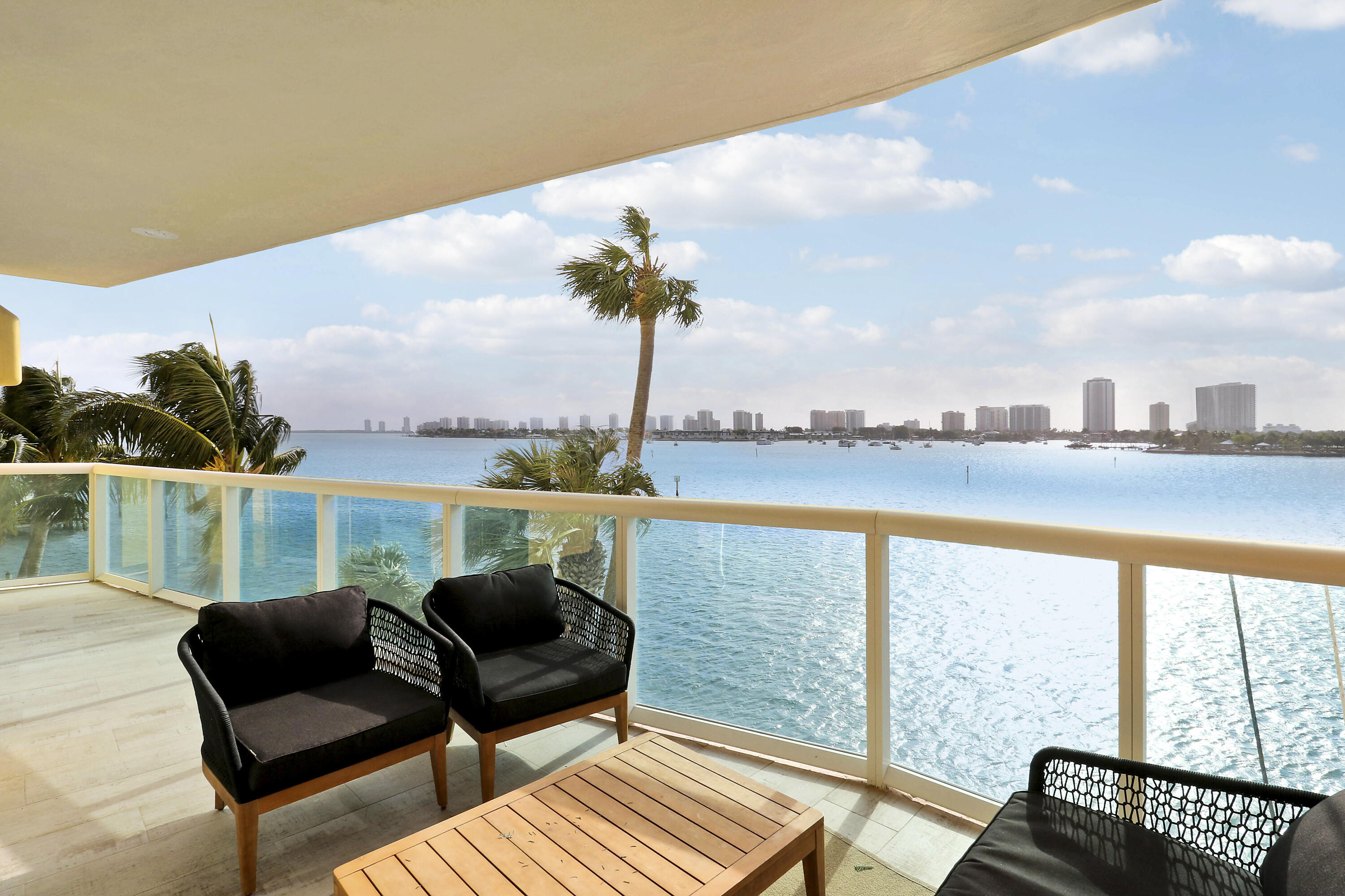 2640 Lake Shore Drive, Unit 307 Riviera Beach, FL 33404 - Photo 20 of 44 a view of a lake with furniture