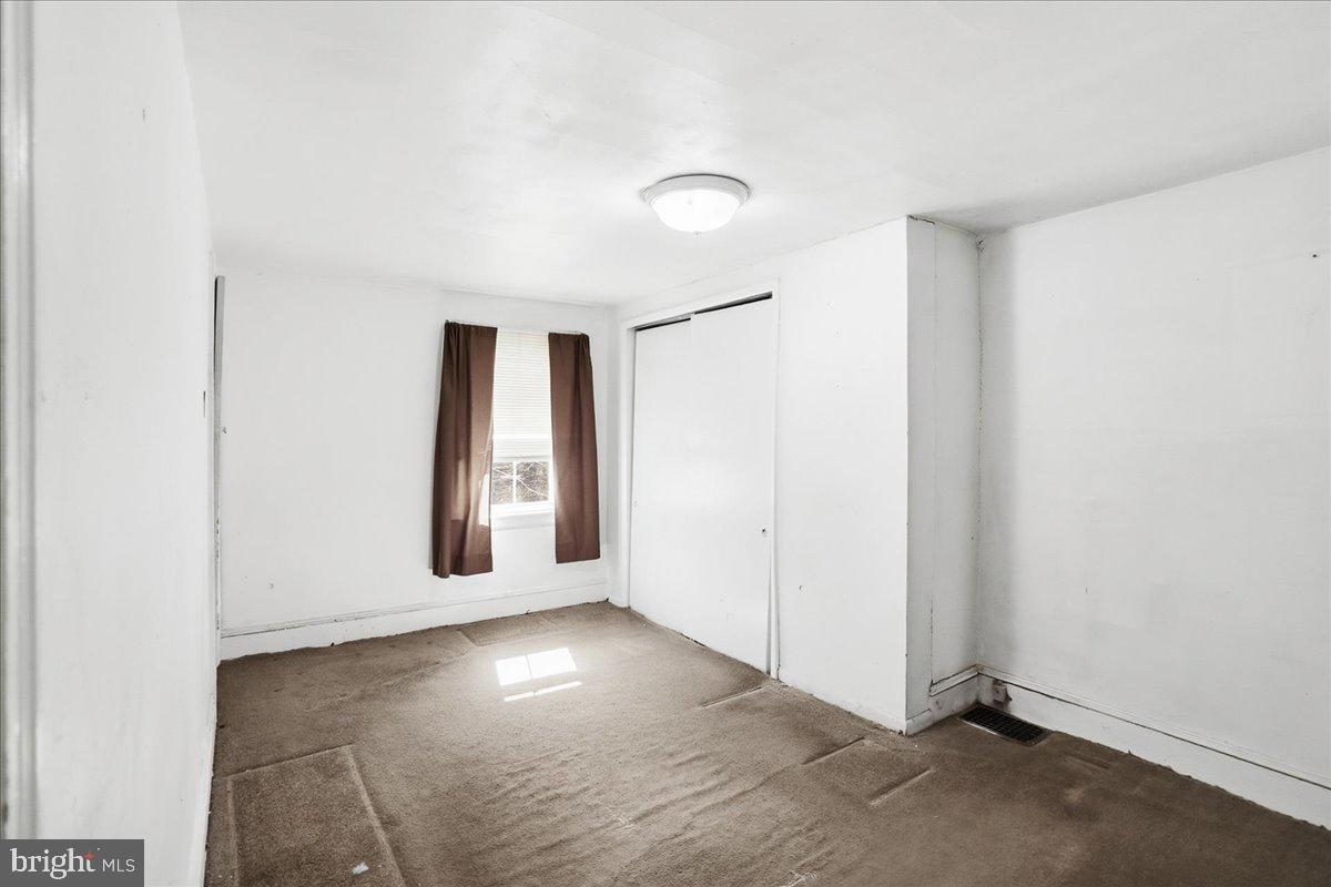 966 Upper Gulph Road Wayne, PA 19087 - Photo 13 of 23 an empty room with windows and closet