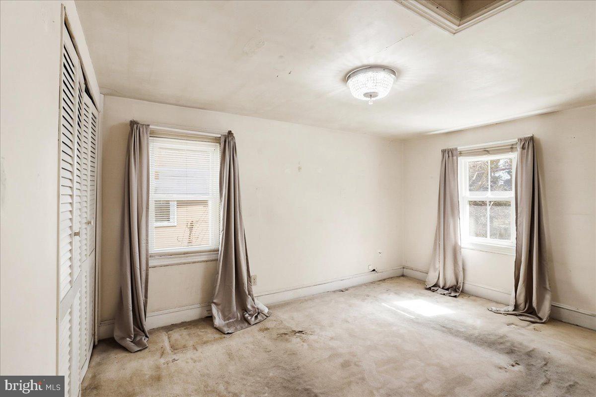 966 Upper Gulph Road Wayne, PA 19087 - Photo 15 of 23 an empty room with windows