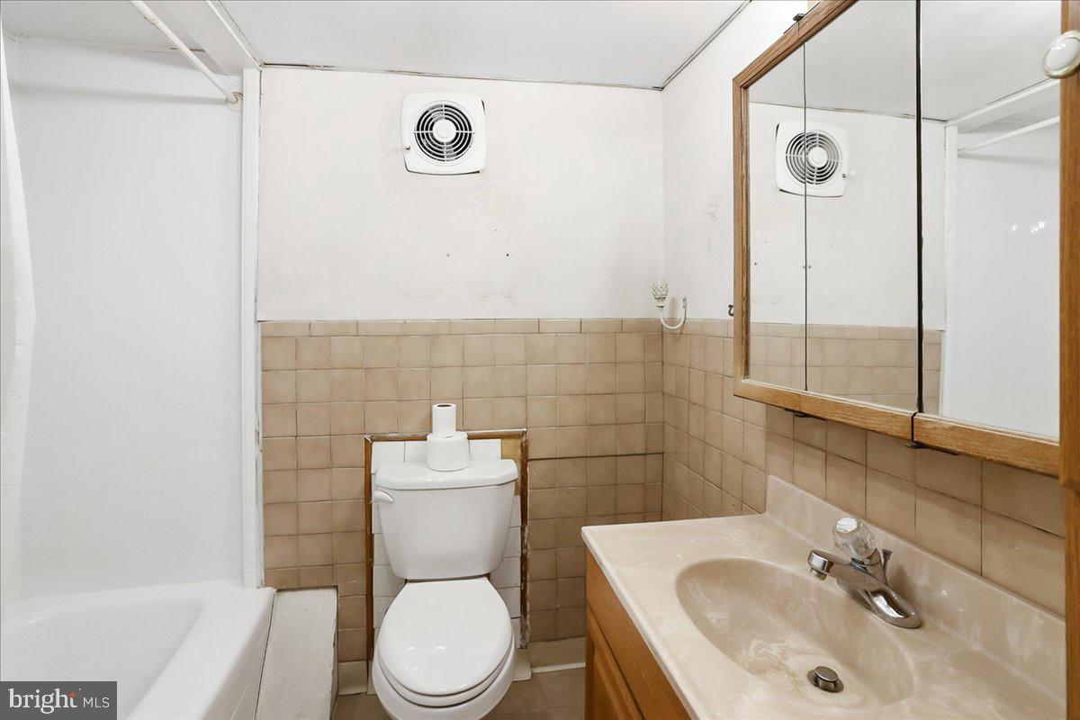 966 Upper Gulph Road Wayne, PA 19087 - Photo 17 of 23 a bathroom with a sink a toilet and shower