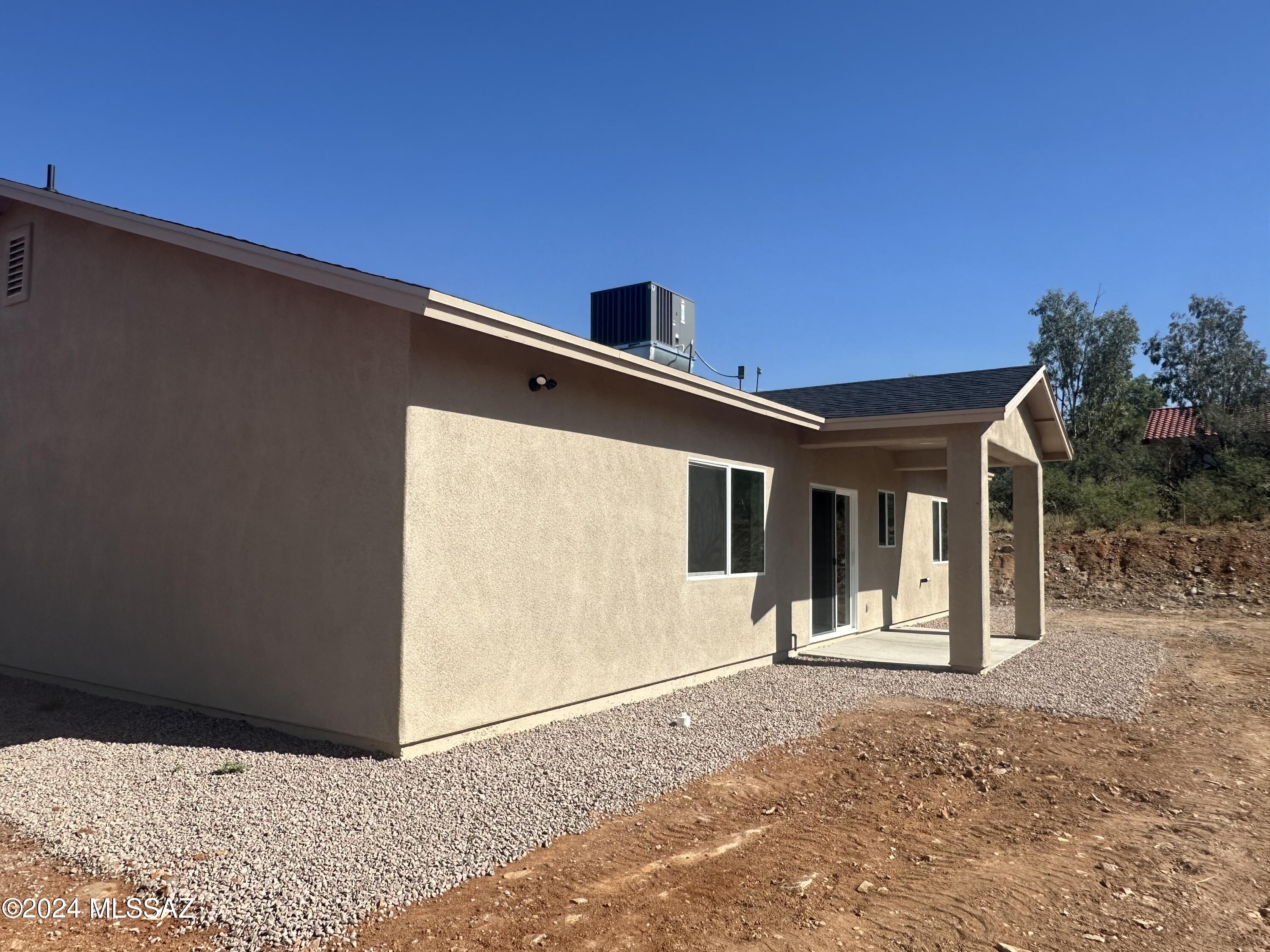169 Camino Mar Rio Rico, AZ 85648 - Photo 5 of 40 a view of a house with wooden fence
