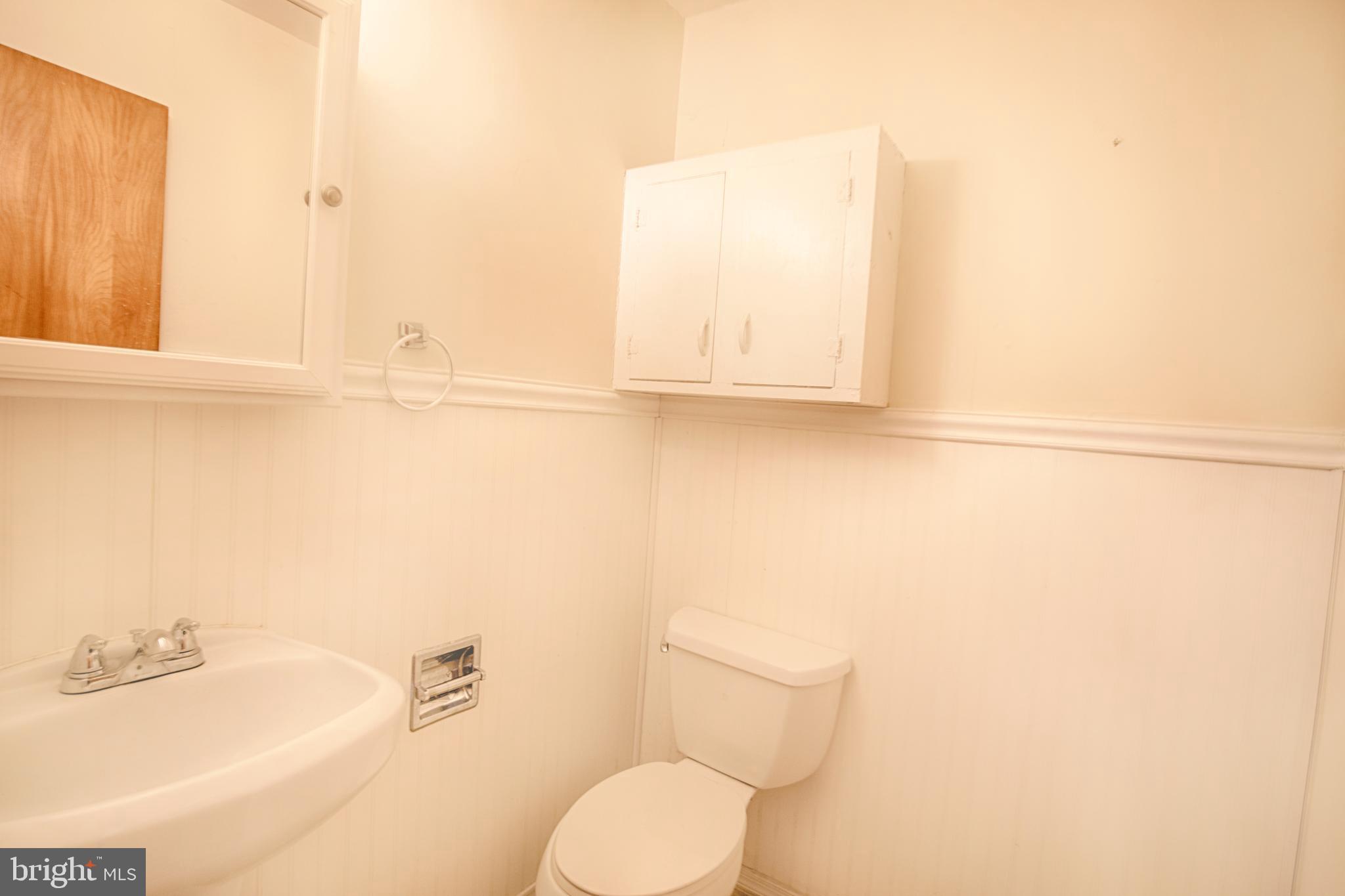 2833 Scarff Road Fallston, MD 21047 - Photo 14 of 24 Powder room w chair rail & wainscotting on main