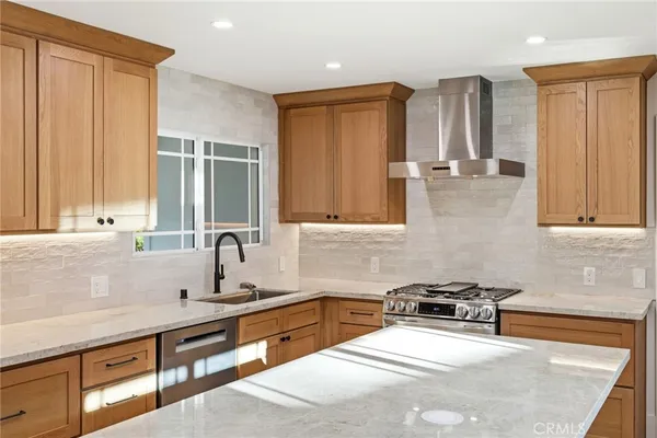 a bathroom with a double vanity sink and a bathtub