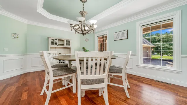 a kitchen with granite countertop a stove and a sink