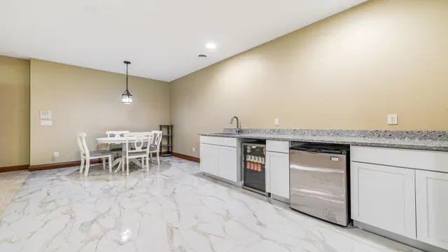 a view of a swimming pool with a yard