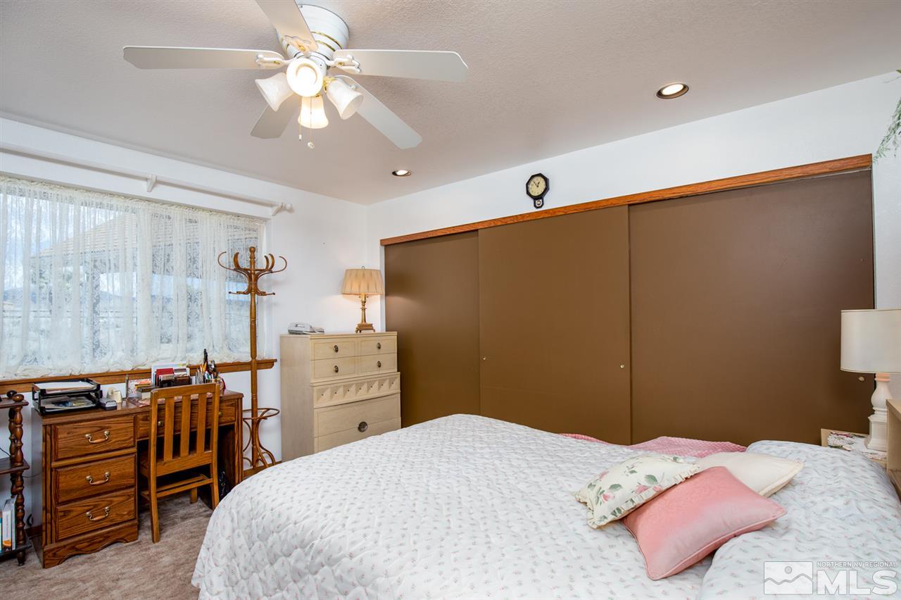1719 Sunrise Pass Road Minden, NV 89423 - Photo 11 of 39 a bedroom with a bed and a closet