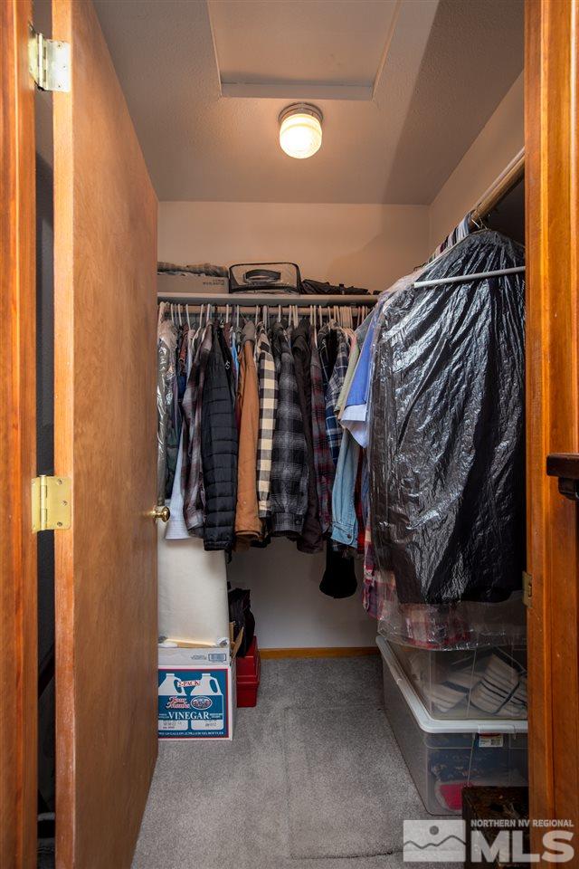 1719 Sunrise Pass Road Minden, NV 89423 - Photo 17 of 39 a view of walk in closet with clothes and shoes